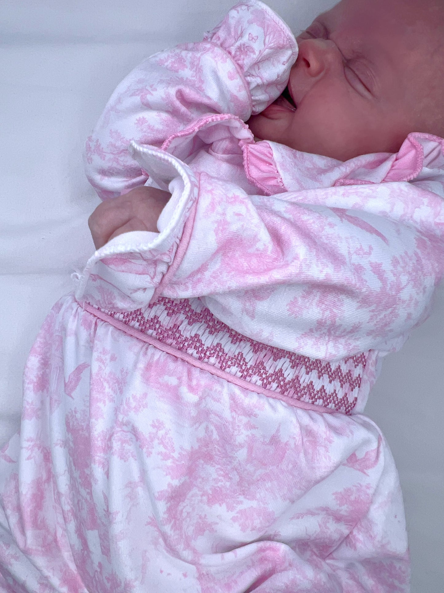 Pink toile smocked babygrow