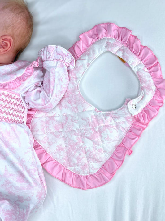 Pink toile quilted bib