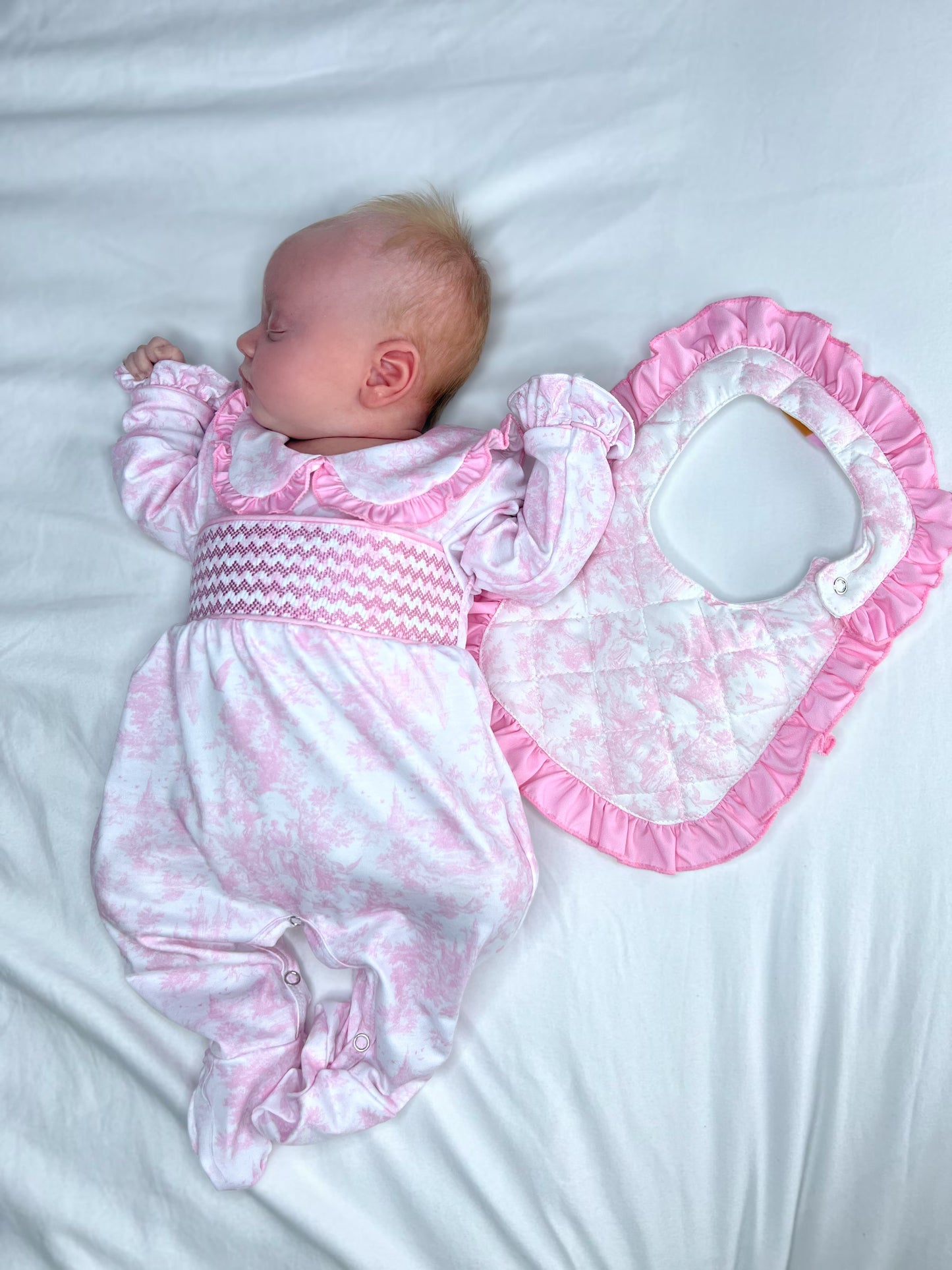 Pink toile smocked babygrow