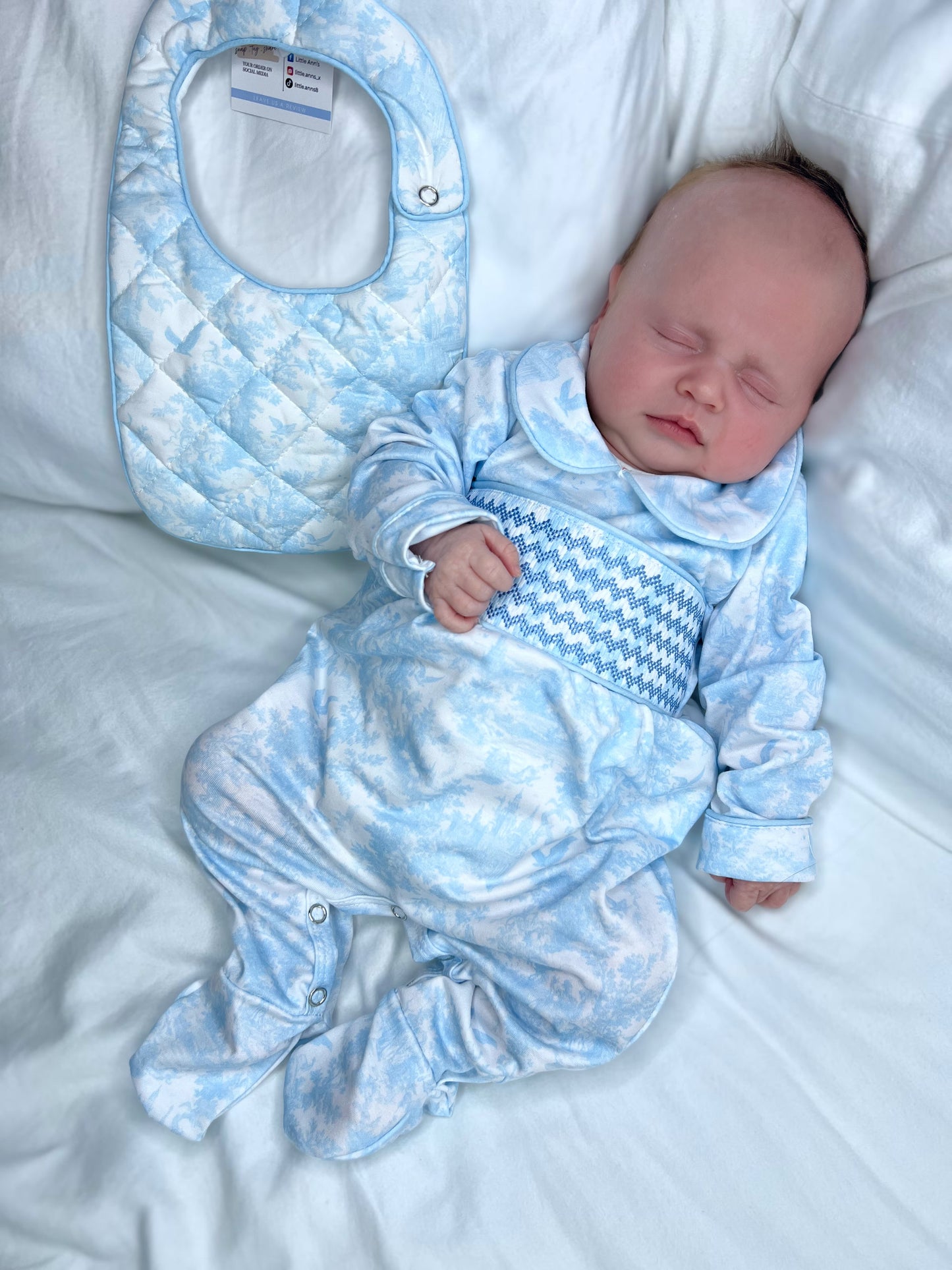 Toile smocked babygrow